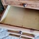 Old wooden chest of drawers raw and black wood