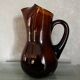 Ancienne carafe en verre ambré