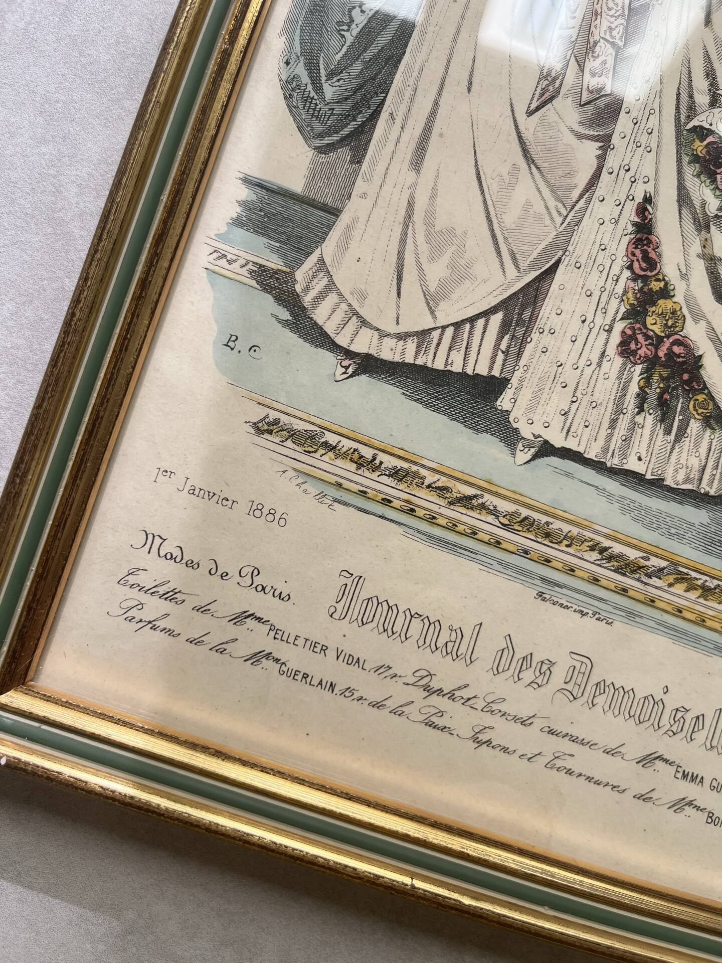 Pair of framed fashion engravings from the 19th century.