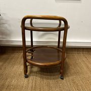Vintage curved wooden rolling dessert trolley – smoked glass top