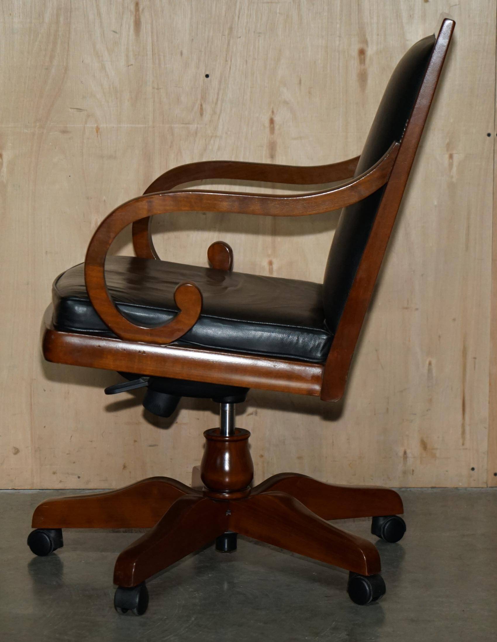 Captain's armchair in leather and cherry wood Grange Paris