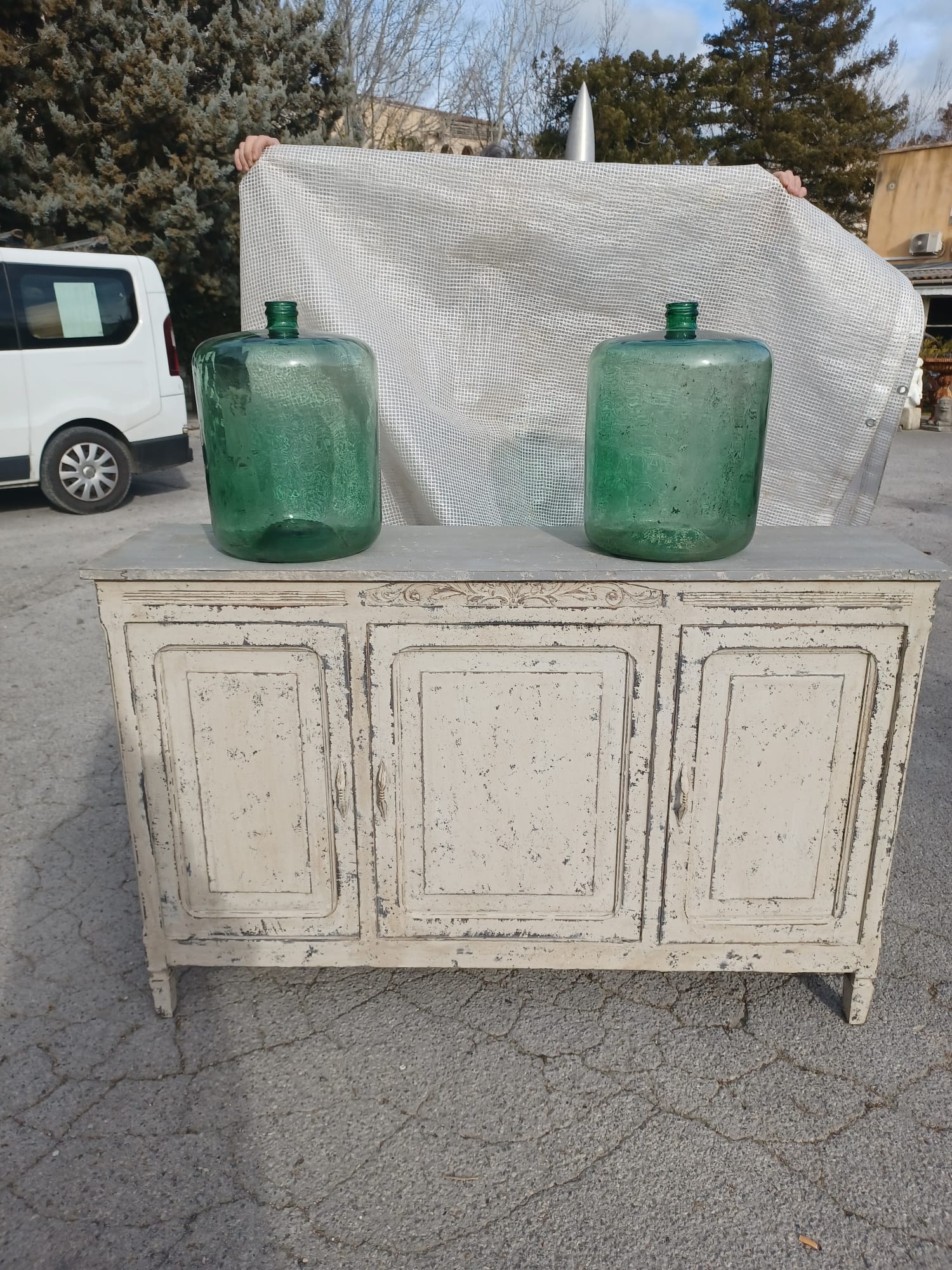 Two large glass bottles