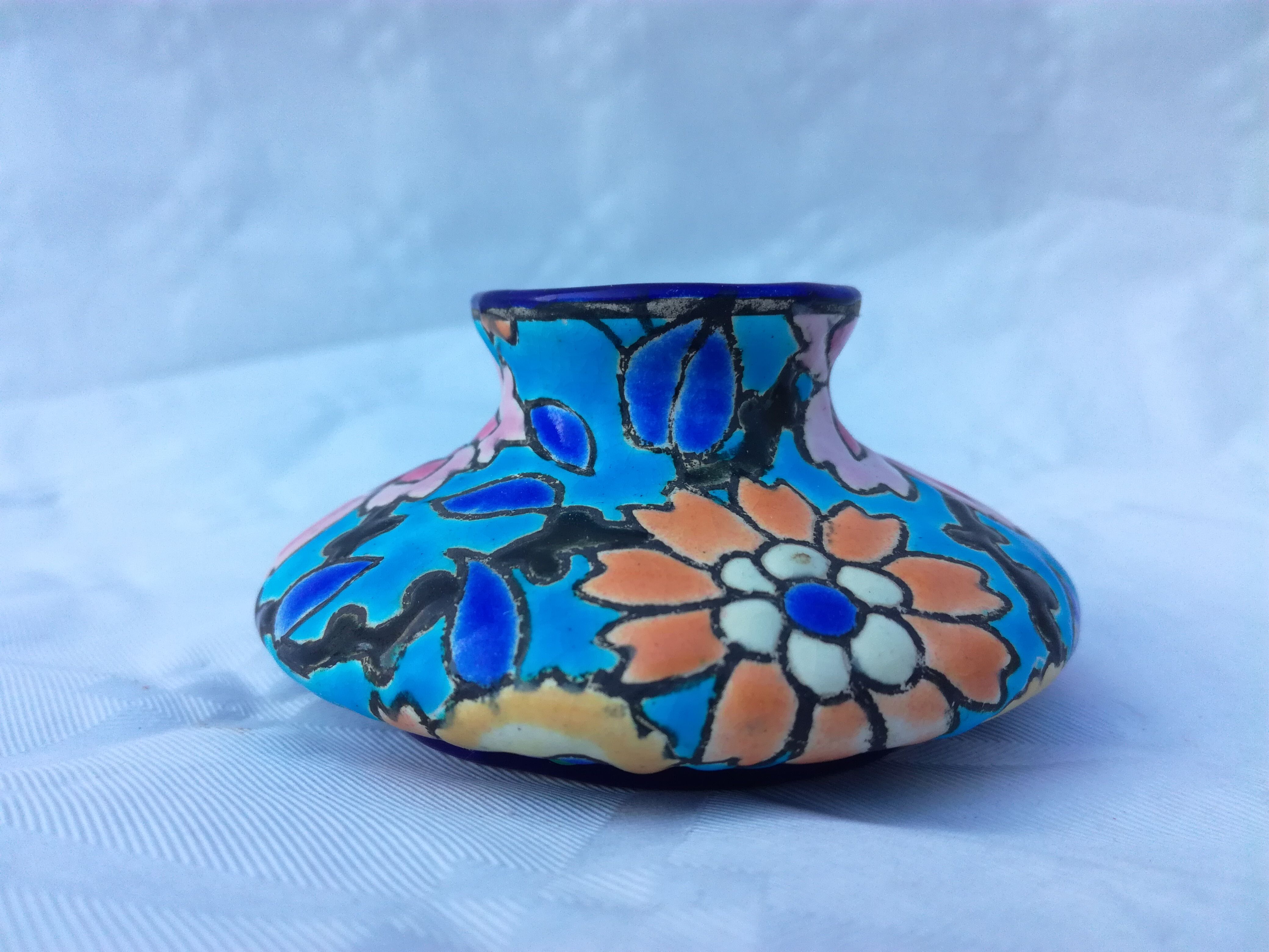 Faience vase and longwy enamels