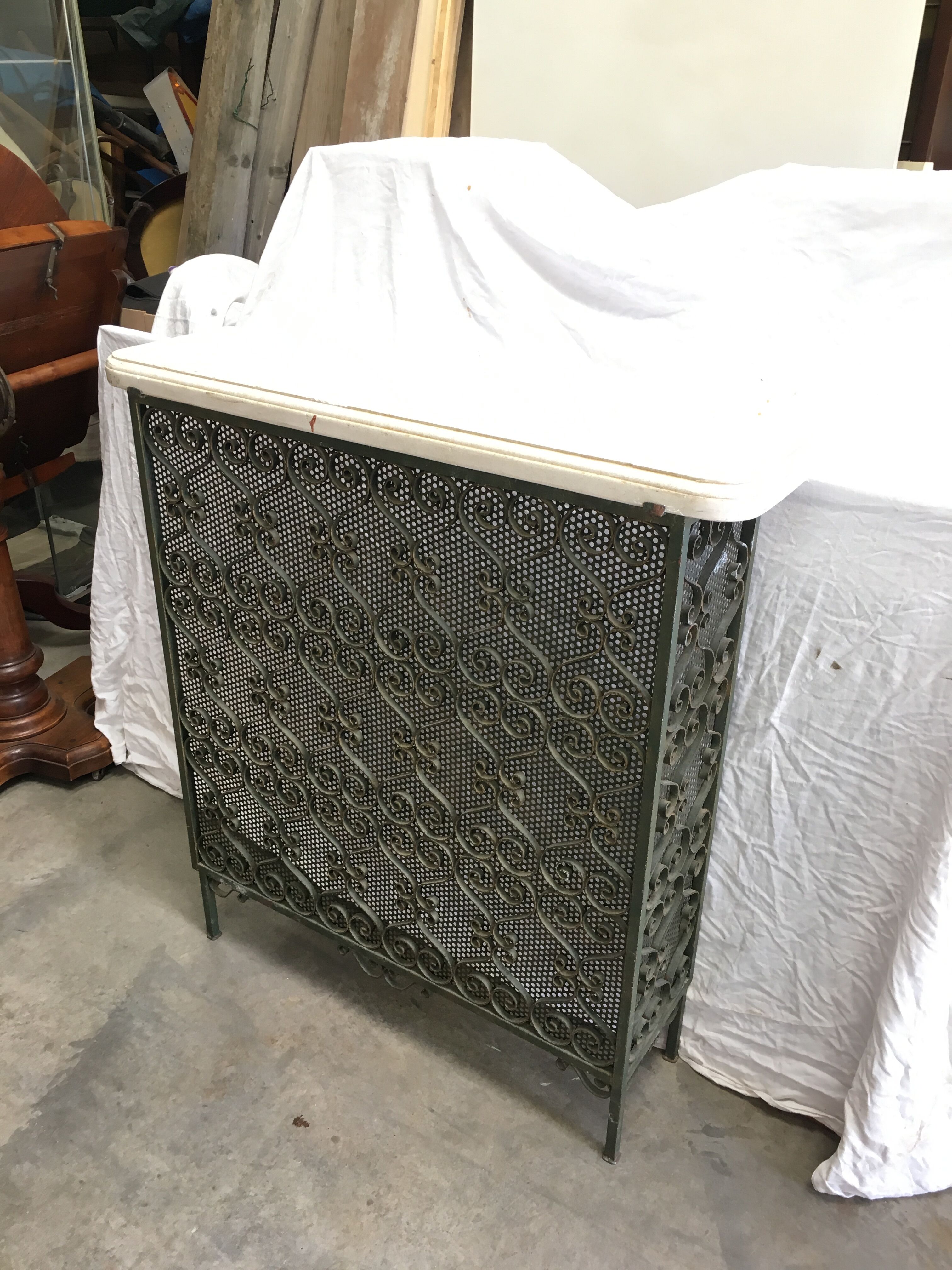 Wrought iron radiator cover