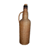 Braided rattan/wicker bottle