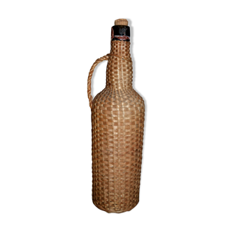 Braided rattan/wicker bottle
