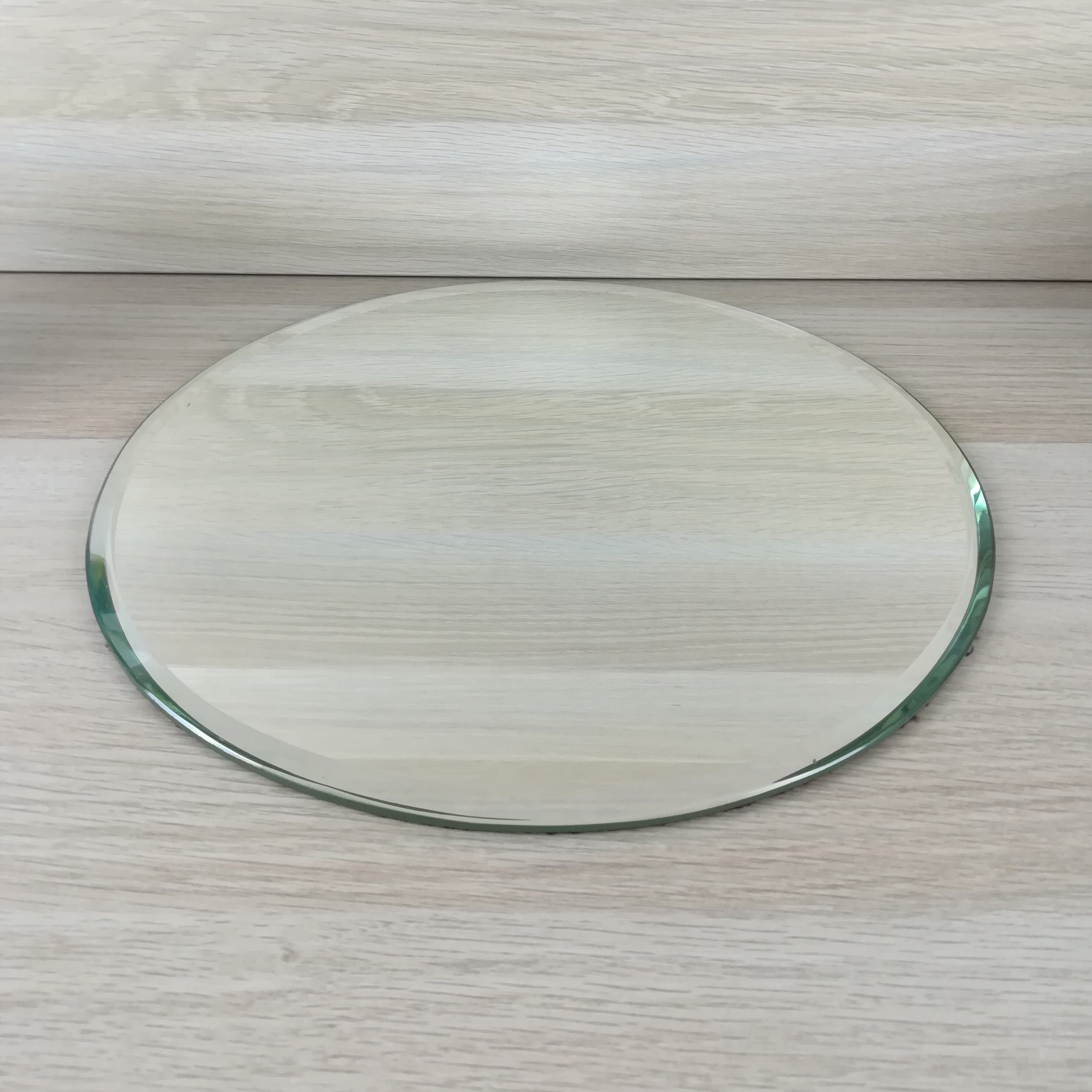 Mirror beveled round top