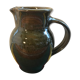 Former green enamelled sandstone pitcher