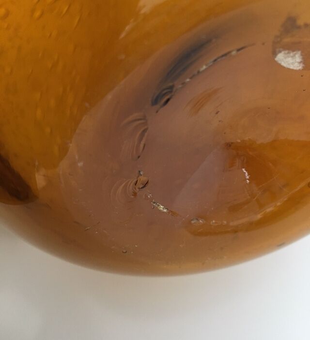 Biot blown glass amber bottle
