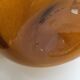 Biot blown glass amber bottle