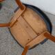 2 chairs in black skai compass legs Louis Paolozzi