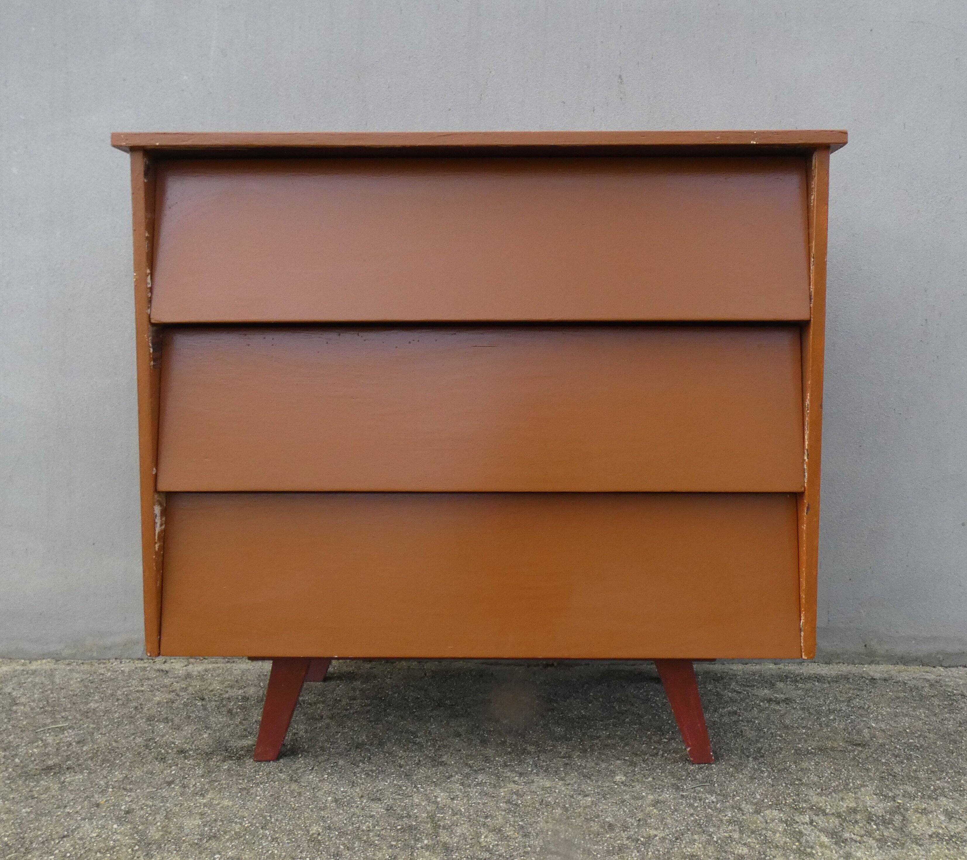 vintage wooden chest of drawers with tapered legs