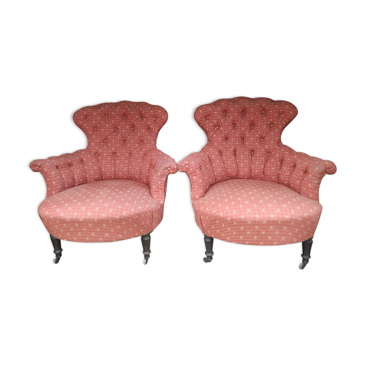 Pair of toad armchairs on wheels, upholstered.
