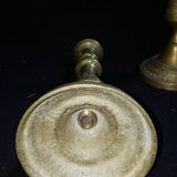 Former pair of bronze candlesticks