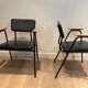Paire de fauteuils laqués noirs modèle "M" de Pierre Guariche, vers 1950