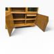 Vintage wooden display cabinet with green glass.