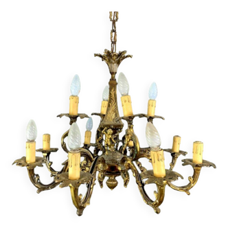 Napoleon III style chandelier in gilded bronze and patinated with putti decorations