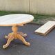 Extendable round dining table with central leg, renovated in solid wood, 200cm