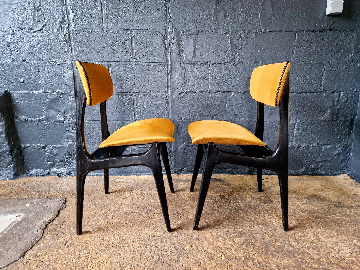 2 vintage chairs in black lacquered wood and yellow/mustard fabric, 1960