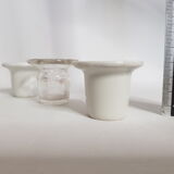Three white porcelain and glass inkwells for school desk