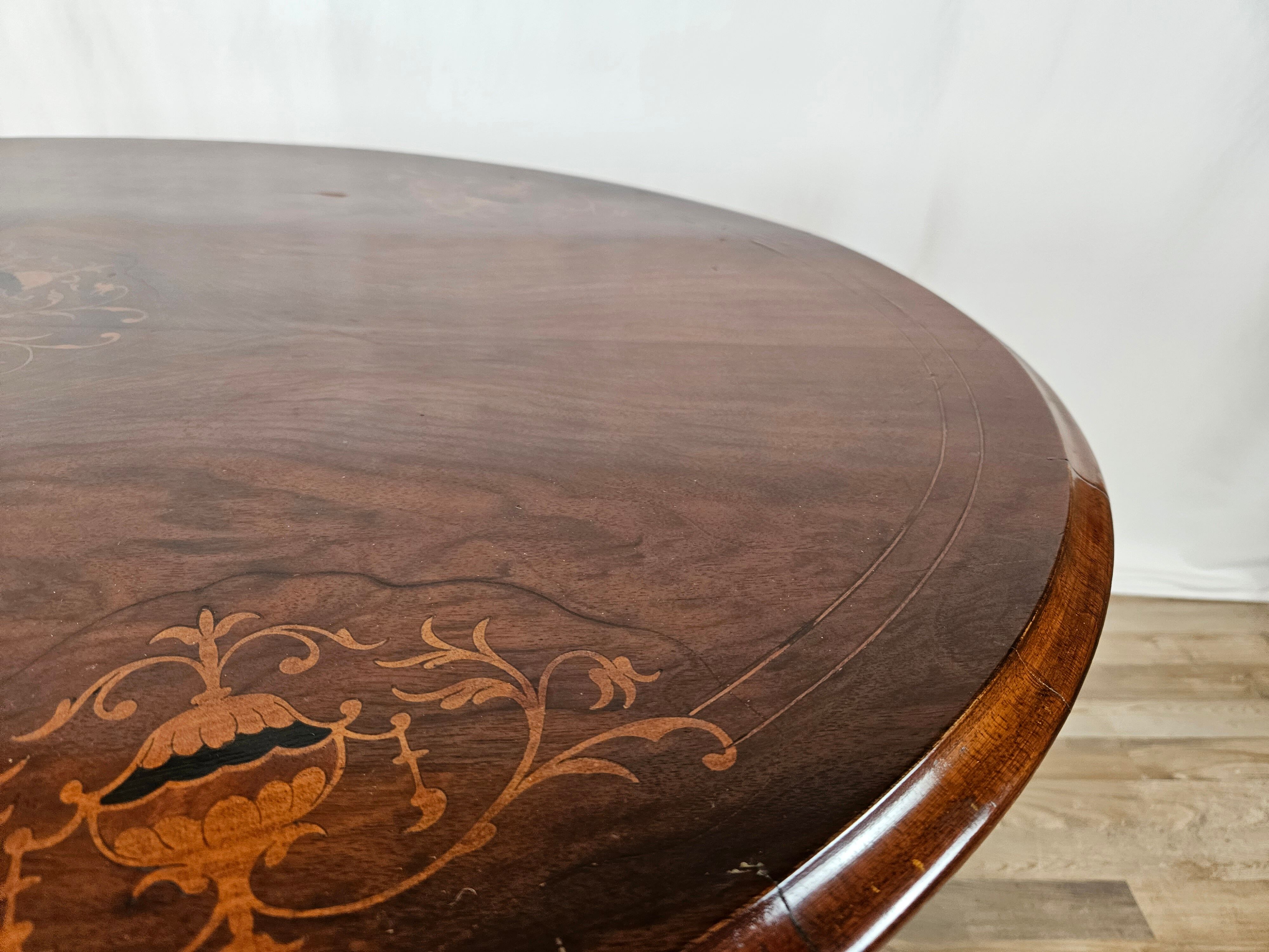 Coffee table in walnut with maple inlays and wheels