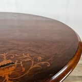 Coffee table in walnut with maple inlays and wheels