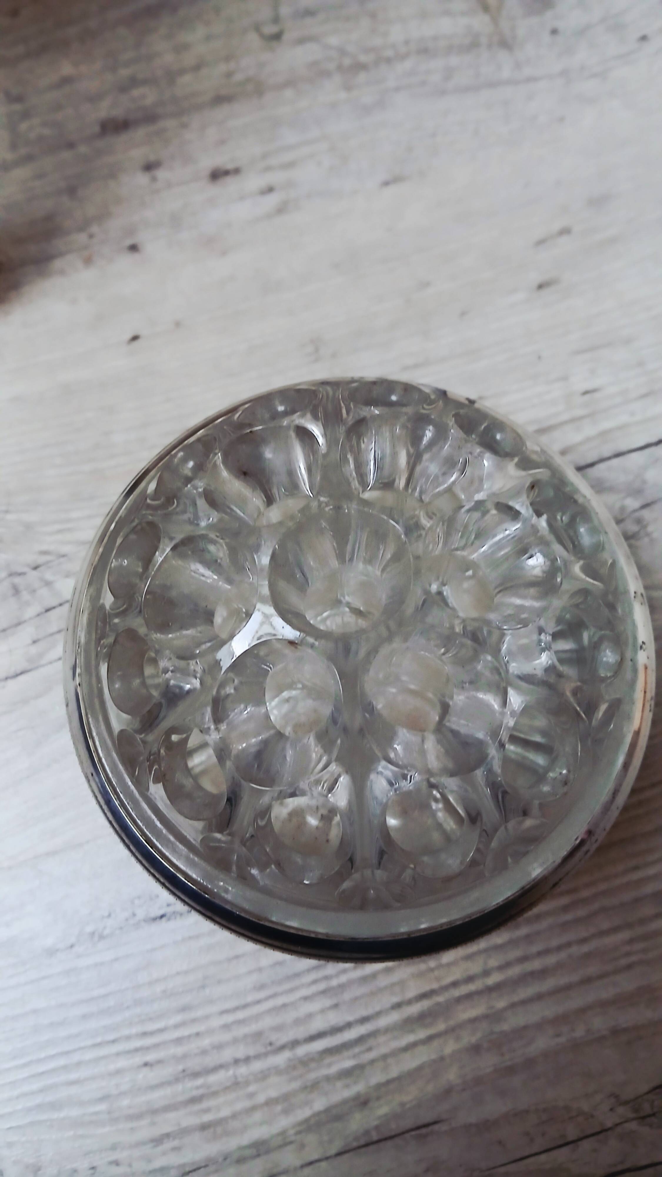 Glass flower arrangement from REIMS on a silver-plated metal stand.