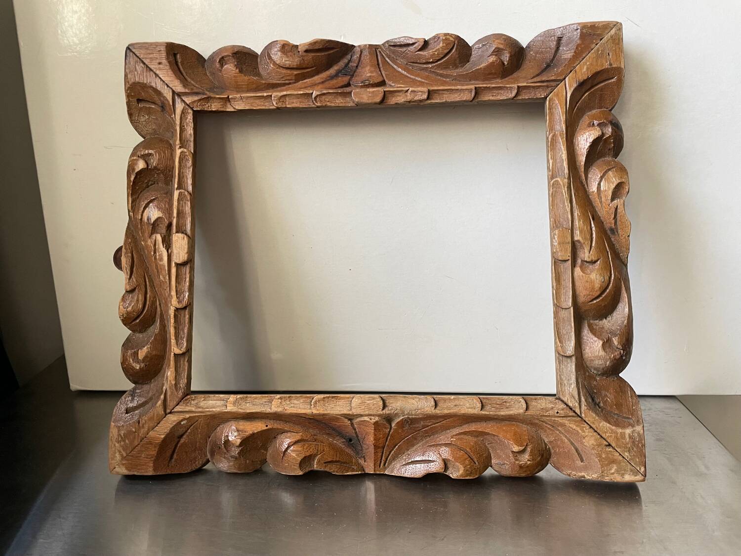 Antique handcarved frame   solid wood 33.5  x 29 cm  opening measurements 23.5 cm x 19 cm cedar wood