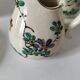 Japanese-style tea set in cracked earthenware with chrysanthemum flowers