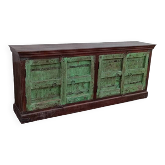 Long wooden sideboard with old green doors