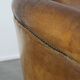 Sturdy, stately and subtle vintage sheepskin club chair