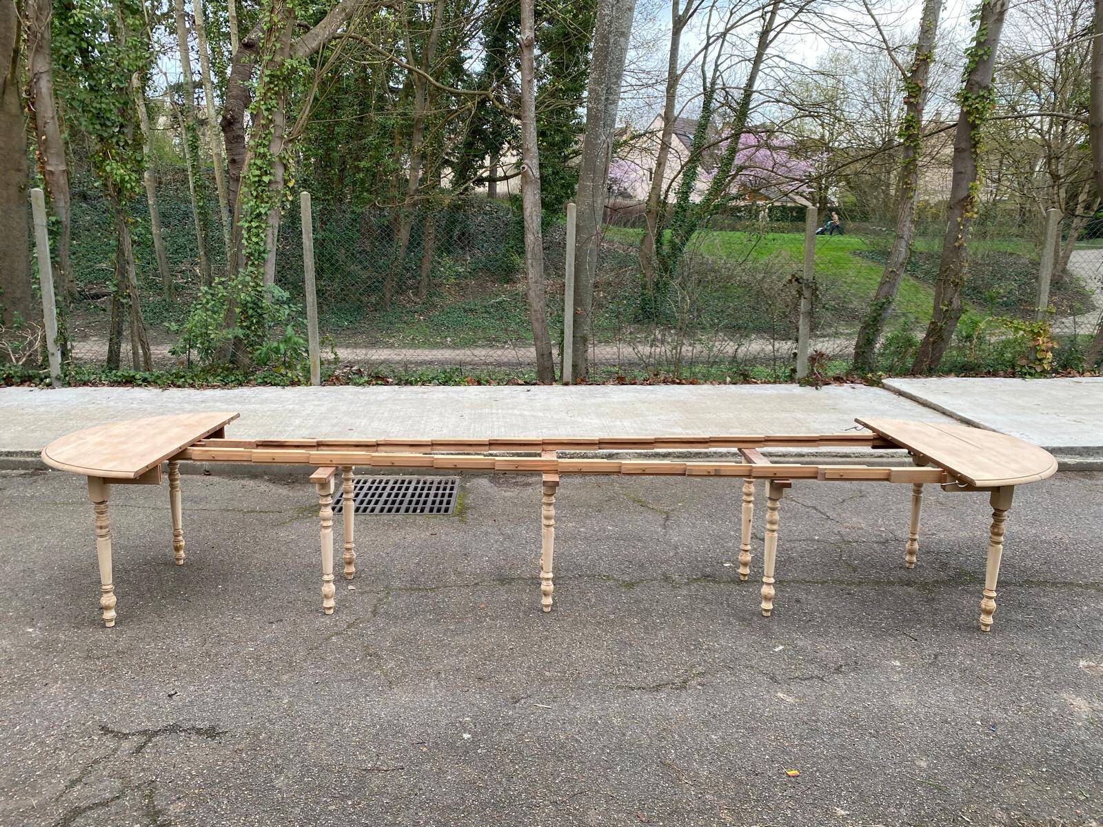 Renovated Louis Philippe extendable round banquet table with leaves, 10 feet.