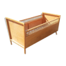 Rattan bed and vintage baby wood