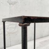 Suite of metal and glass nesting tables.
