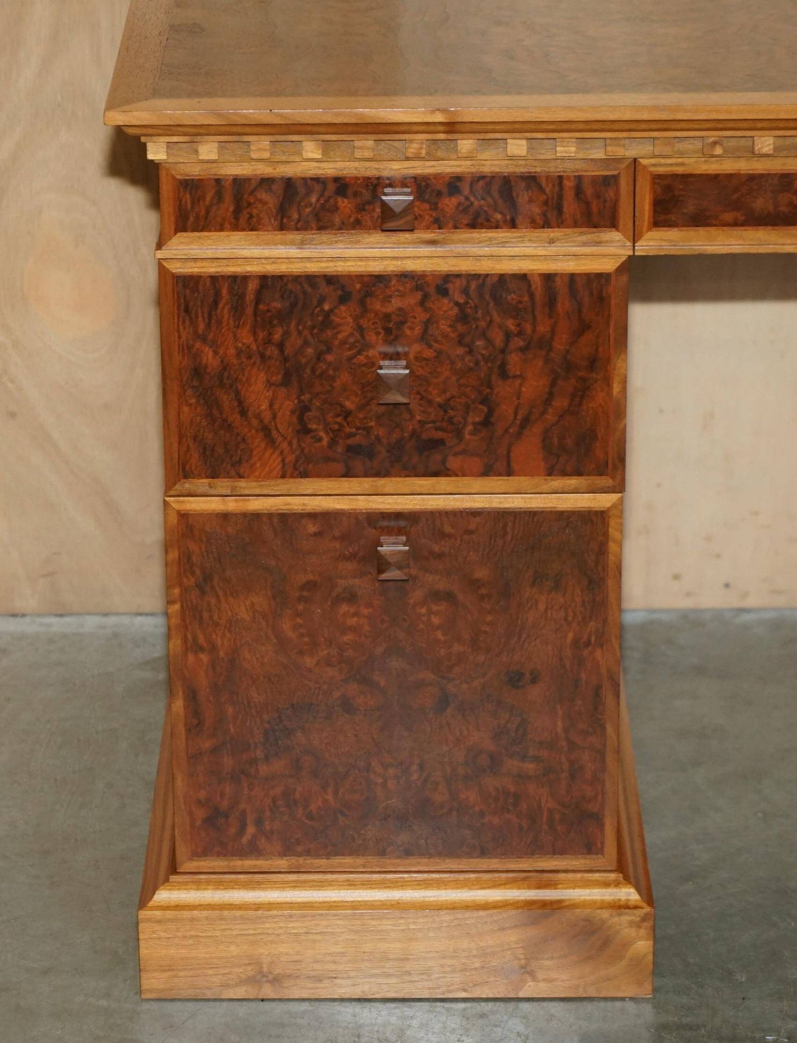 David Linley Burr walnut chest of drawers for light restoration.