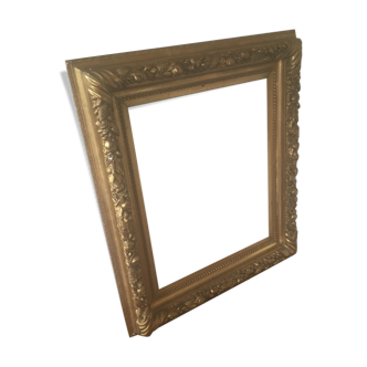 Gilded stucco frame patterned with fruit and foliage patterns