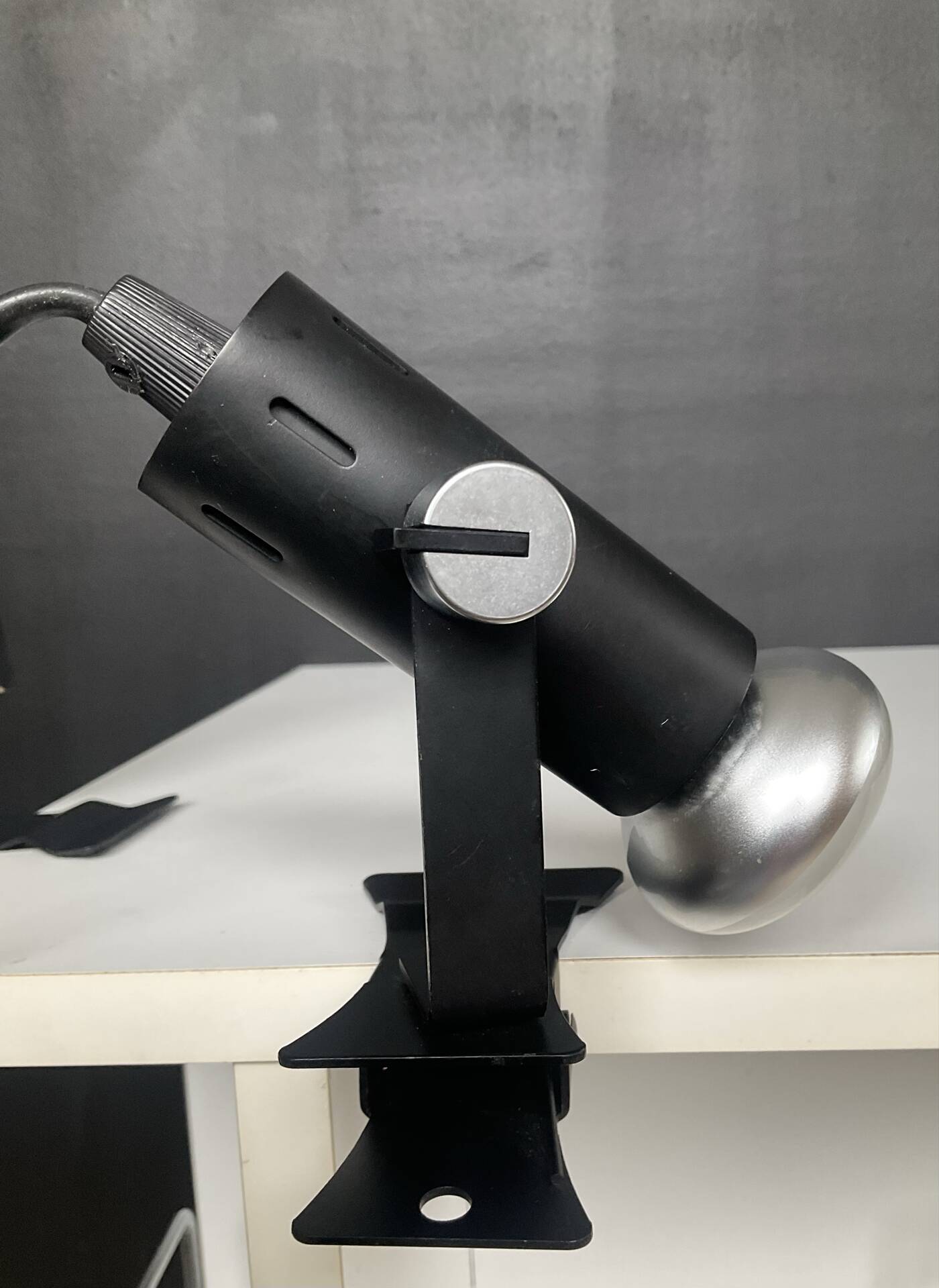A pair of clamp lamps from the 1970s.