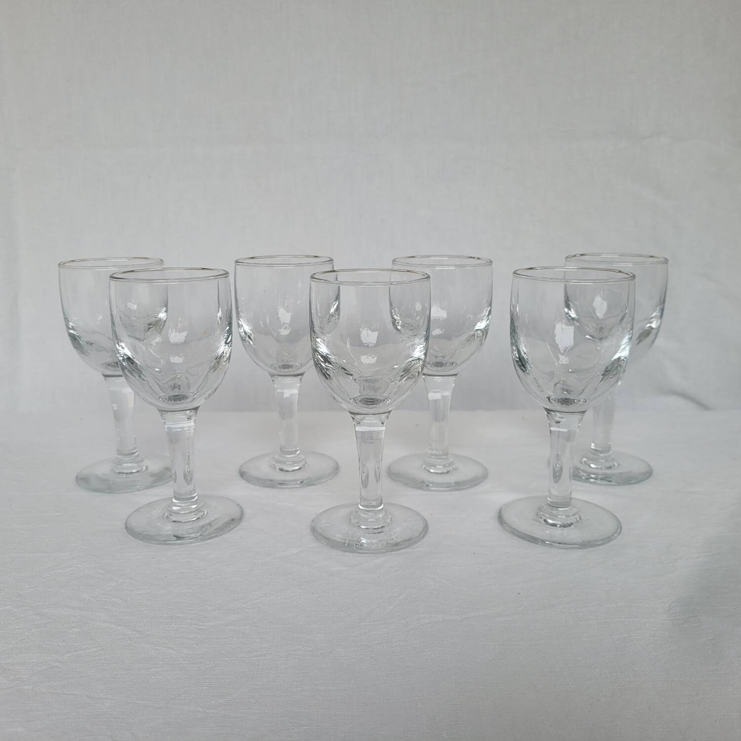 7 antique stemmed glasses made of blown glass – 1930s–1950s