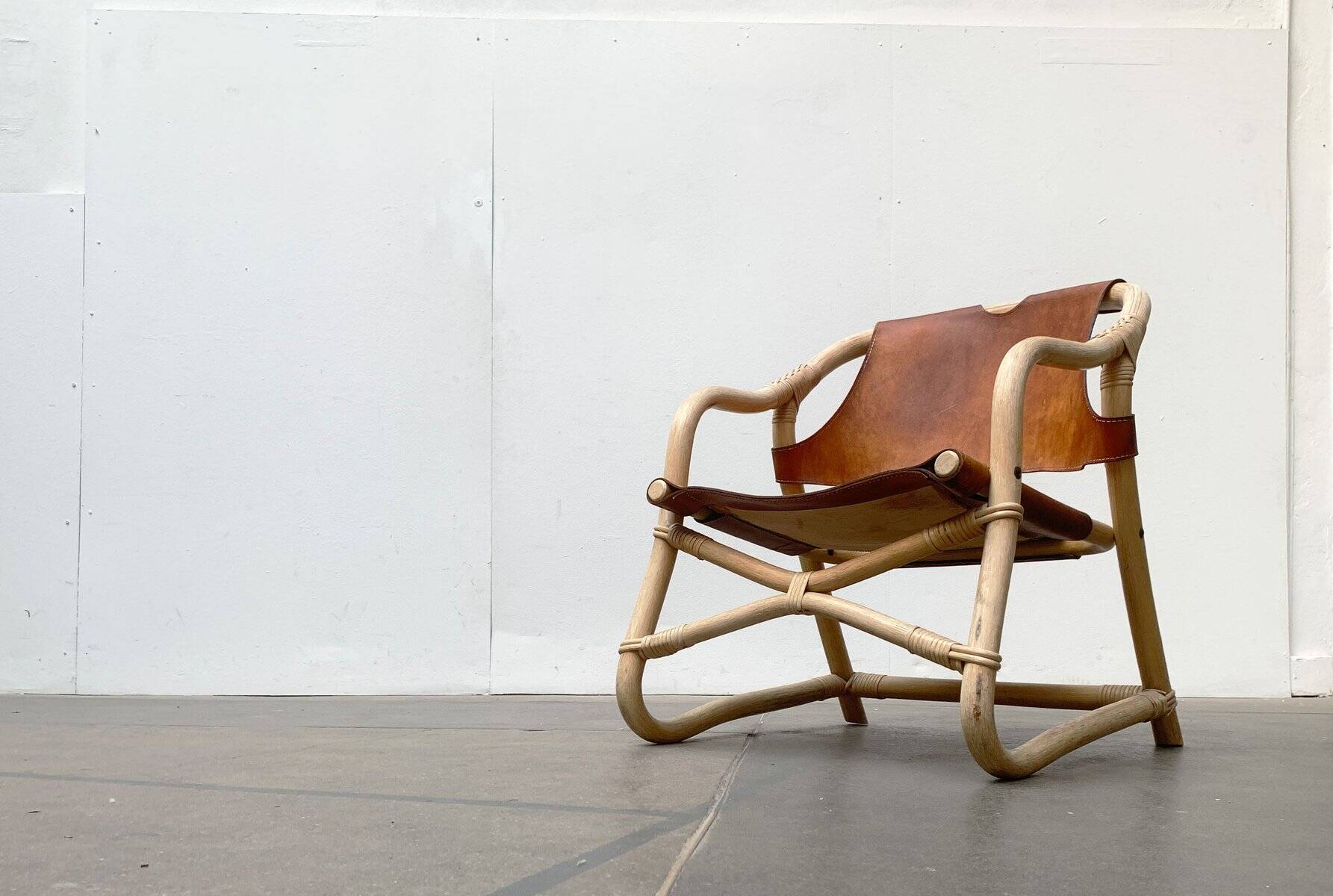 Mid-century safari lounge chair in bamboo and Danish leather, 1960s.