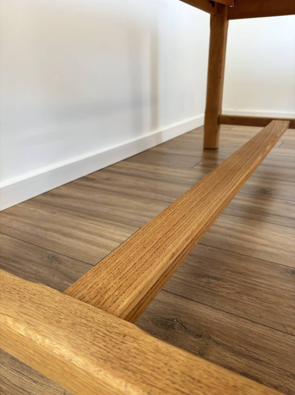 Solid oak farmhouse table with extensions.