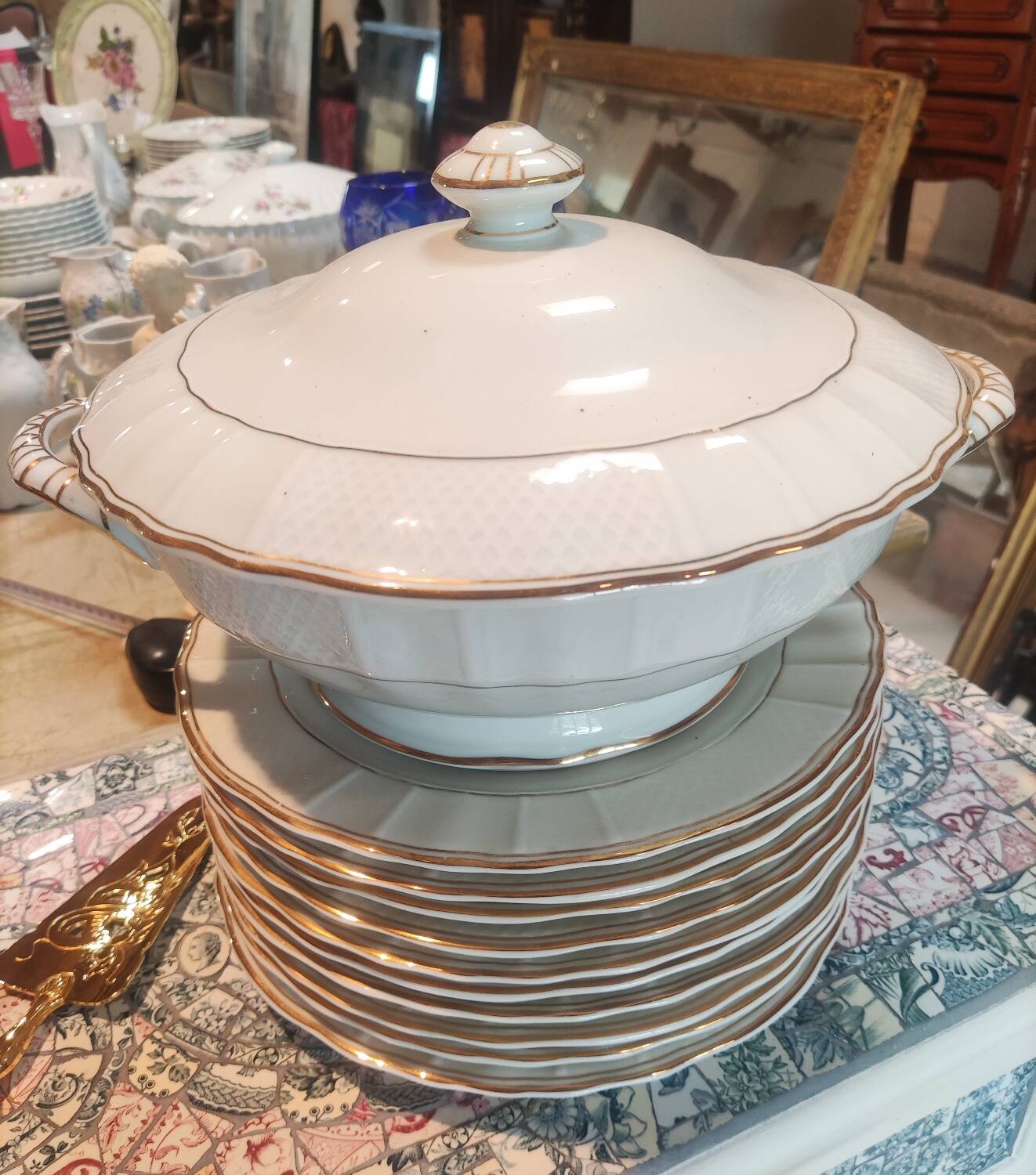 Ten Limoges porcelain plates B et Cie