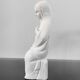 Vintage white plaster statuette of the Virgin Mary.
