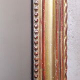Golden mirror with pediment XIXth