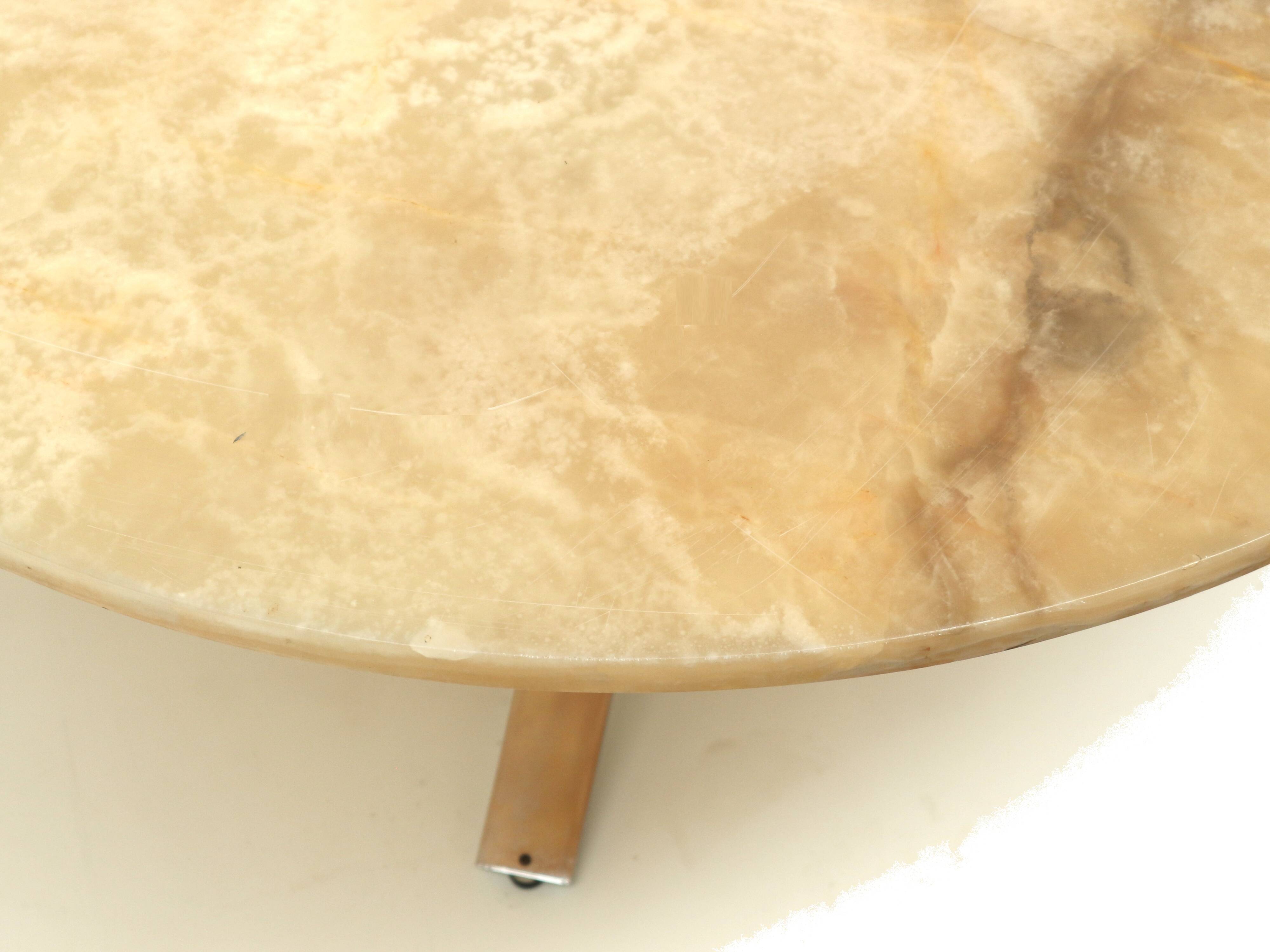 Round vintage onyx coffee table with chrome base from the 70s