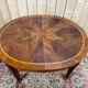 Extendable oval table in Louis XVI style – Walnut and Burl Marquetry