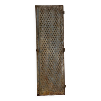 Industrial design: studded cast iron security door for private premises circa 1900-1940 (C)