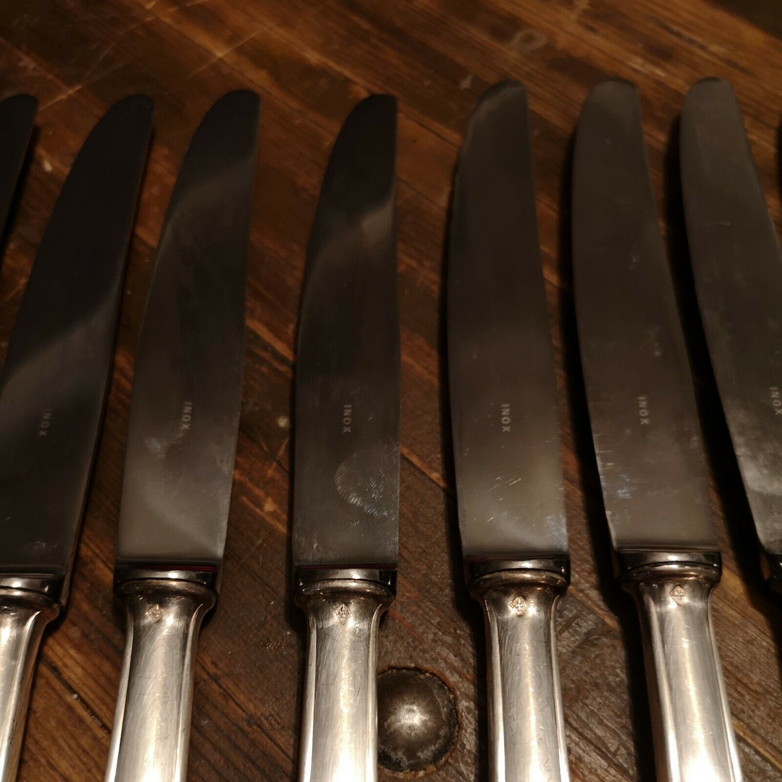 Series of 12 silver metal knives and stainless steel blade Louis XV style floral shell