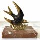 Marble swallow and brass paperweight