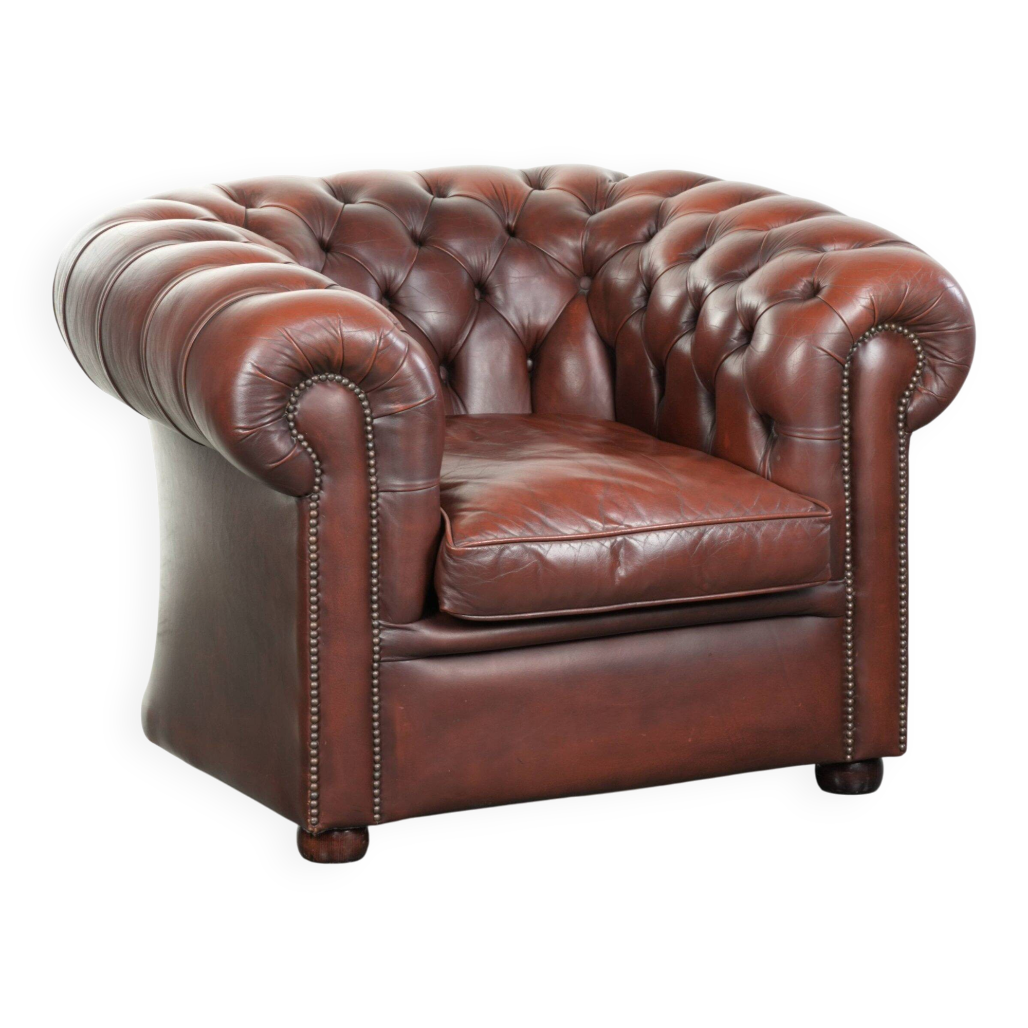 Cowhide Chesterfield armchair in a classic English style