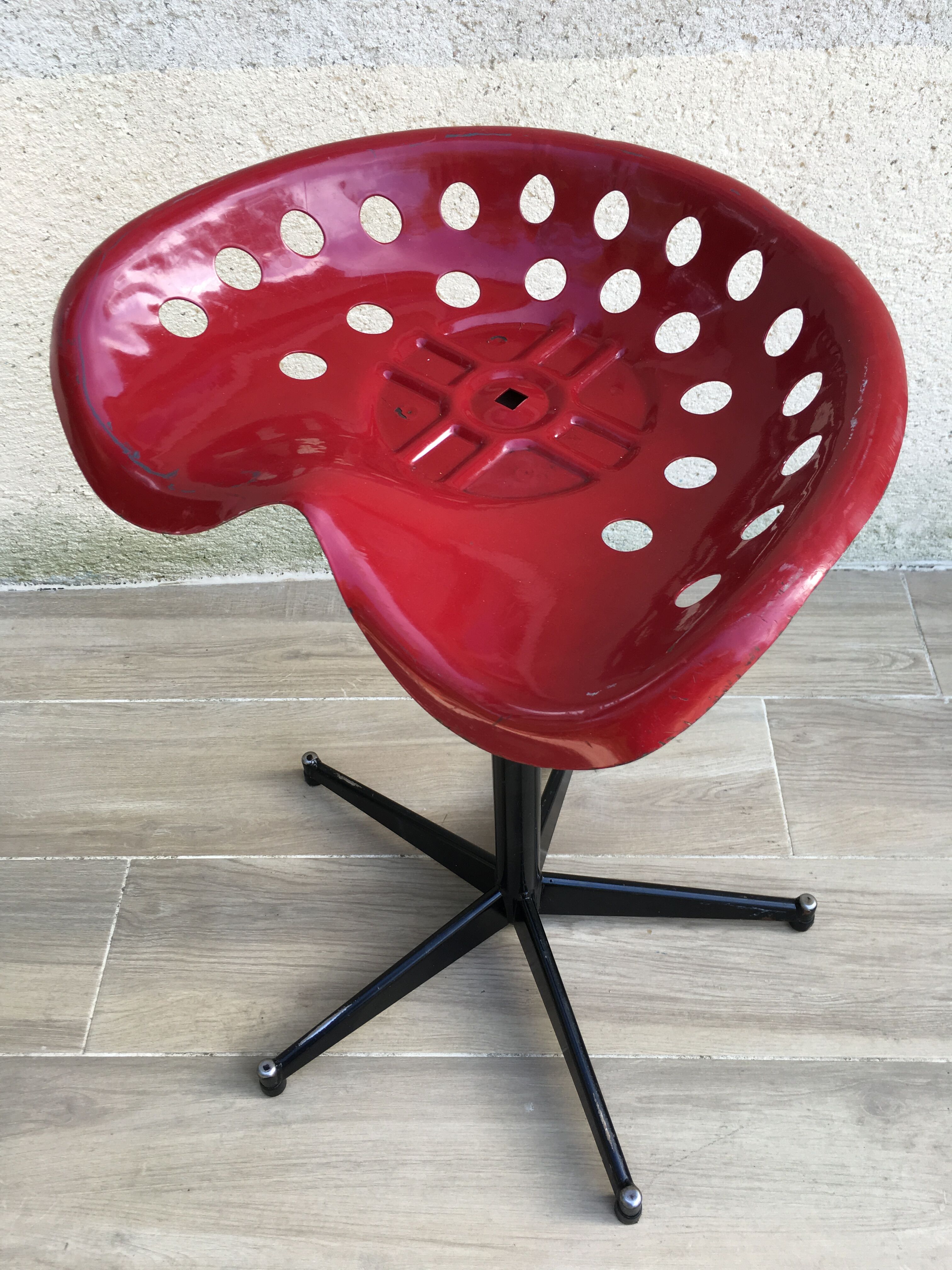 Vintage high stool sitting tractor